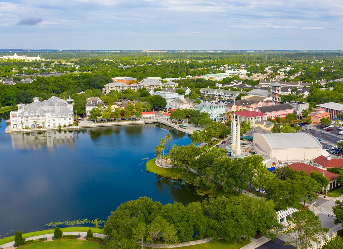Celebration, FL - Aerial View of Celebration, Florida Community and Pond on a Sunny Day
